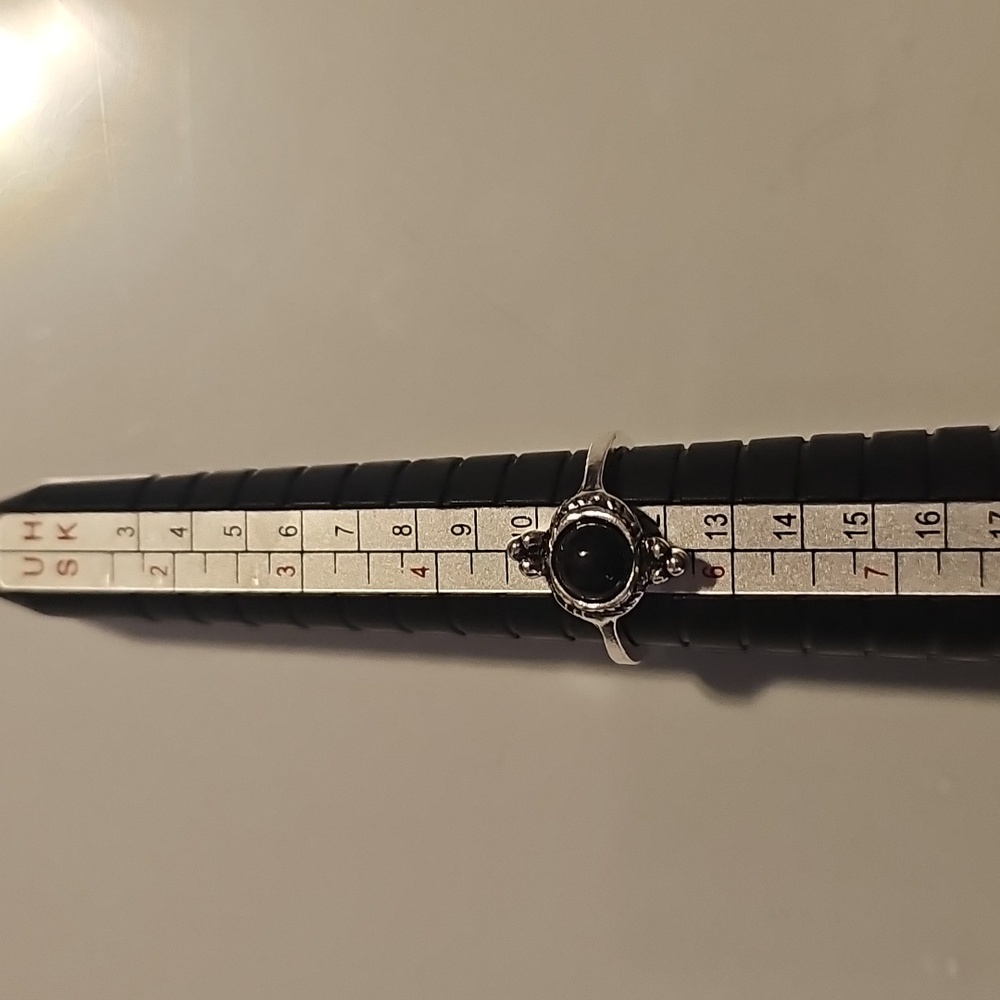 Elegant Silver  Tone Ring with Black Stone